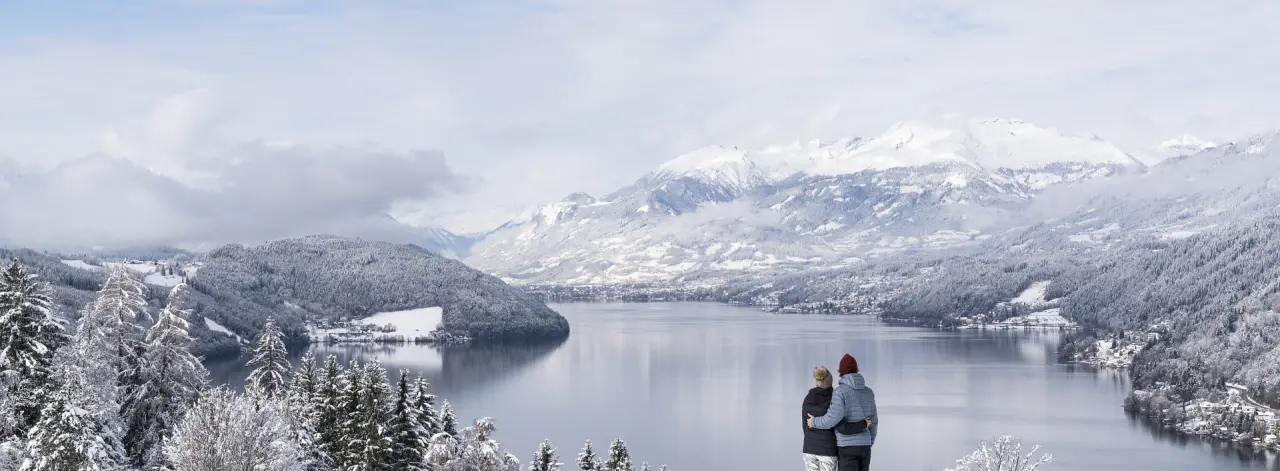 Villa Postillion am See in Millstatt am See – Winterlandschaft mit See und Bergen | Wellnesshotel Kärnten