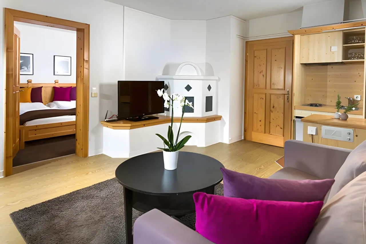 Hotel Goldried in Matrei in Osttirol – Geräumige Suite mit Wohnbereich und Kamin | Wellnesshotel Osttirol