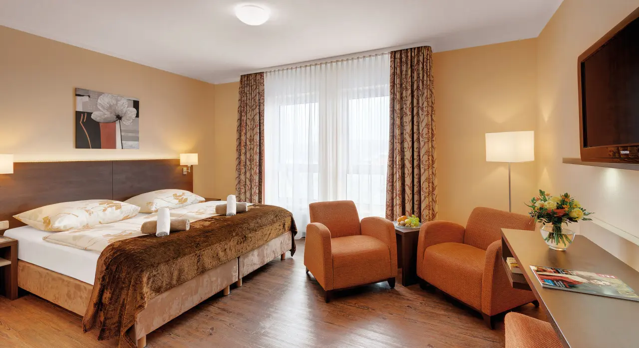 Schlossberghotel Oberhof in Oberhof – Komfortables Doppelzimmer mit Sitzbereich | Wellnesshotel Thüringen