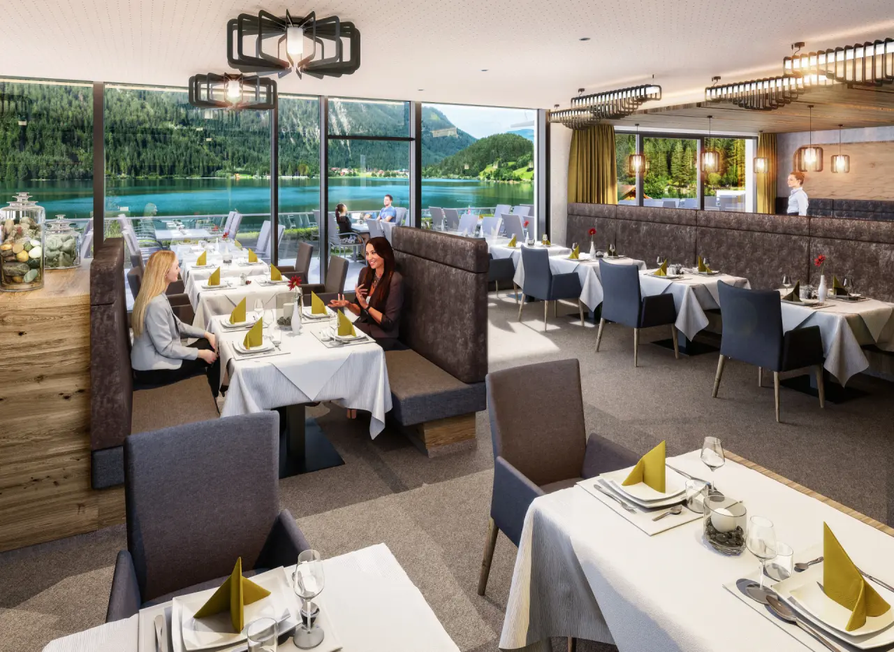 haldensee Naturerlebnis- und Wellnesshotel in Nesselwängle – Helles Restaurant mit Panoramablick auf den Haldensee und die Berge | Wellnesshotel Tirol