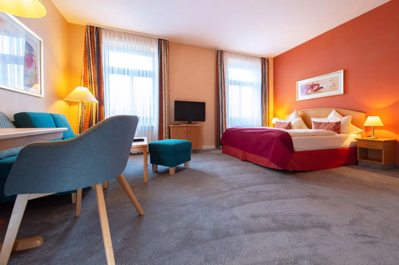 Dappers Hotel in Bad Kissingen – Komfortables Doppelzimmer mit warmer Farbgestaltung | Wellnesshotel Rhön
