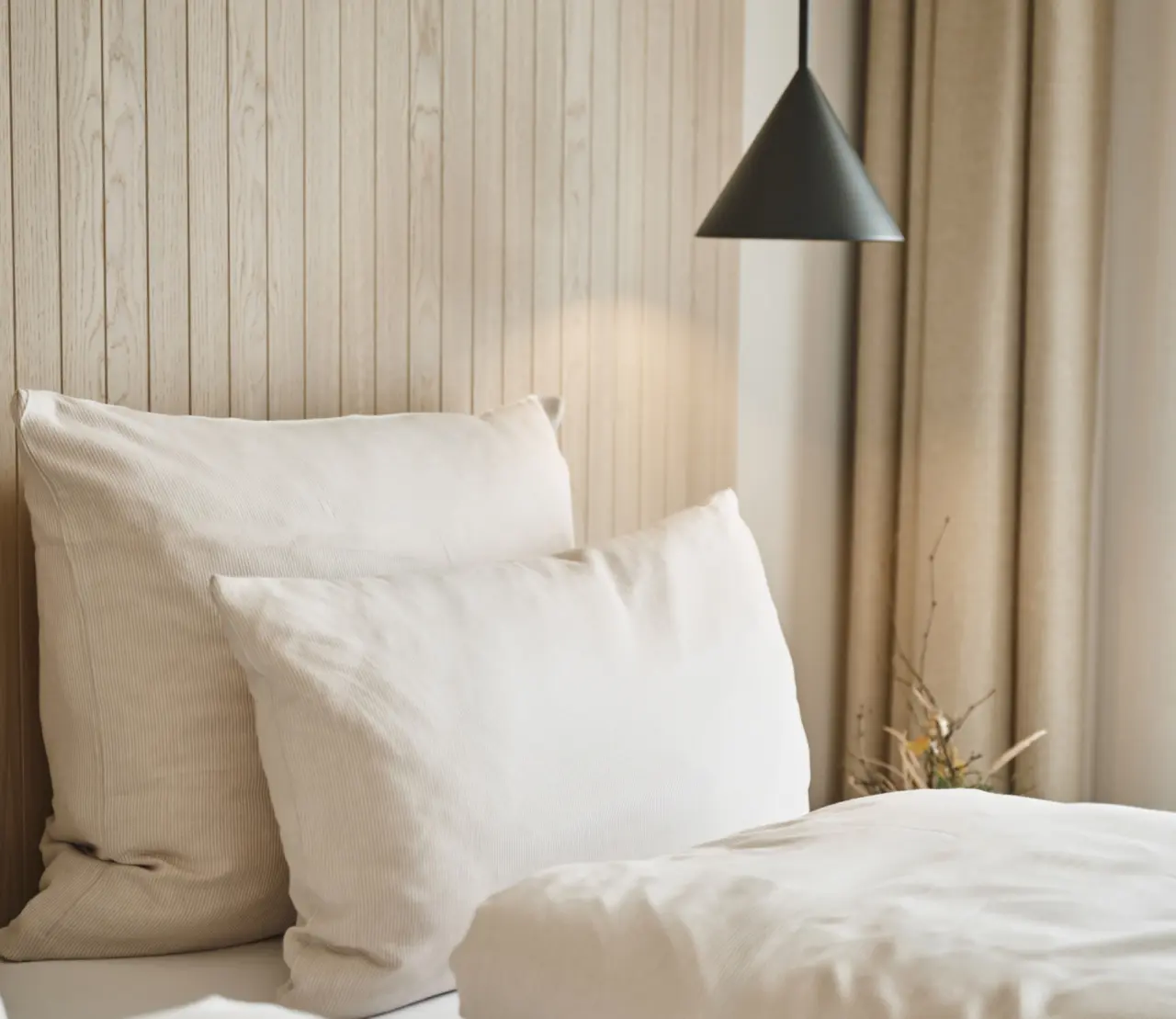 Nouri Hotel in Bad Krozingen – Gemütliches Bett im Hotelzimmer | Wellnesshotel Schwarzwald