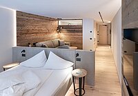 Alpin Spa Hotel die Post in Bormio – Geräumiges Zimmer mit separatem Wohnbereich | Wellnesshotel Alpenregion