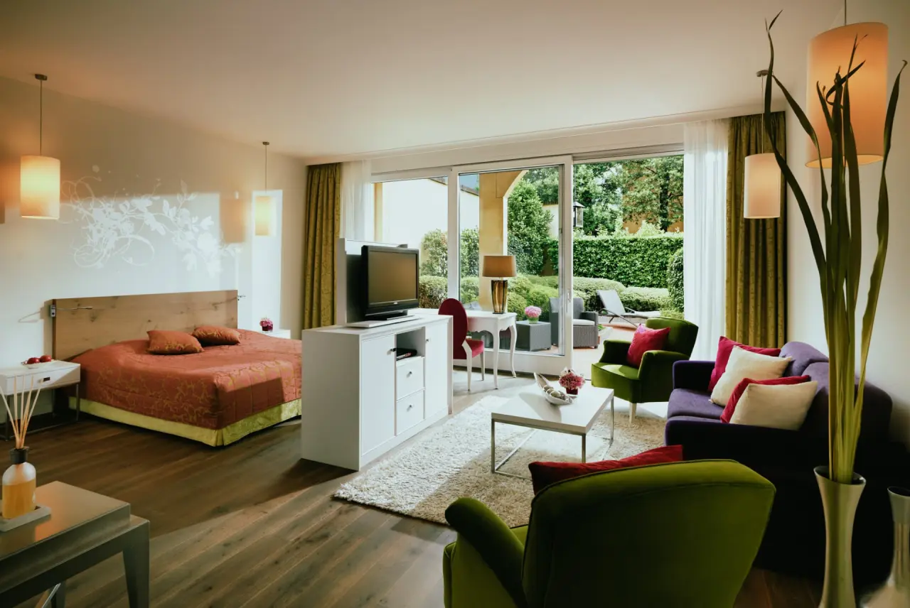 Giardino Ascona in Ascona – Komfortable Suite mit Wohnbereich und Zugang zum Garten | Wellnesshotel Tessin