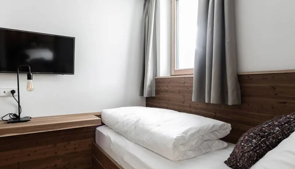 Hotel Traube Post am Reschensee in Reschen – Gemütliches Einzelzimmer mit TV | Wellnesshotel Vinschgau
