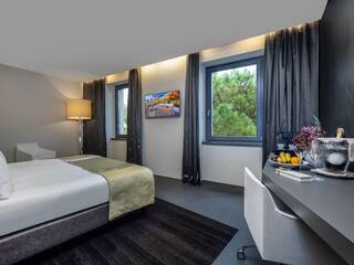 Lido Palace Hotel in Riva del Garda – Komfortables Zimmer mit Willkommensgruß | Wellnesshotel Gardasee